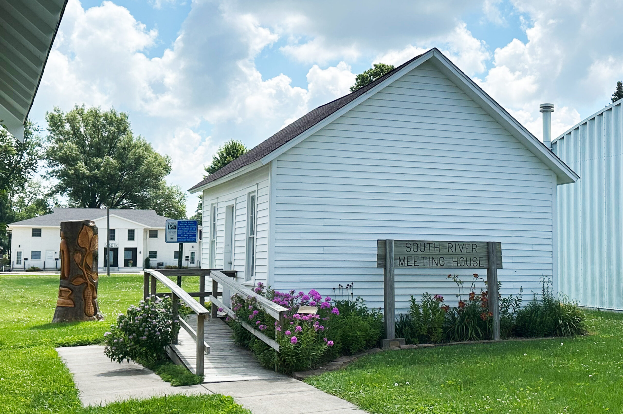 South River Meeting House South River Meeting House, a small white building with a wooden ramp and a sign in front